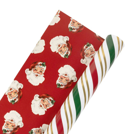 Premium reversible holiday wrapping paper featuring classic candy stripe and vintage Santa artwork