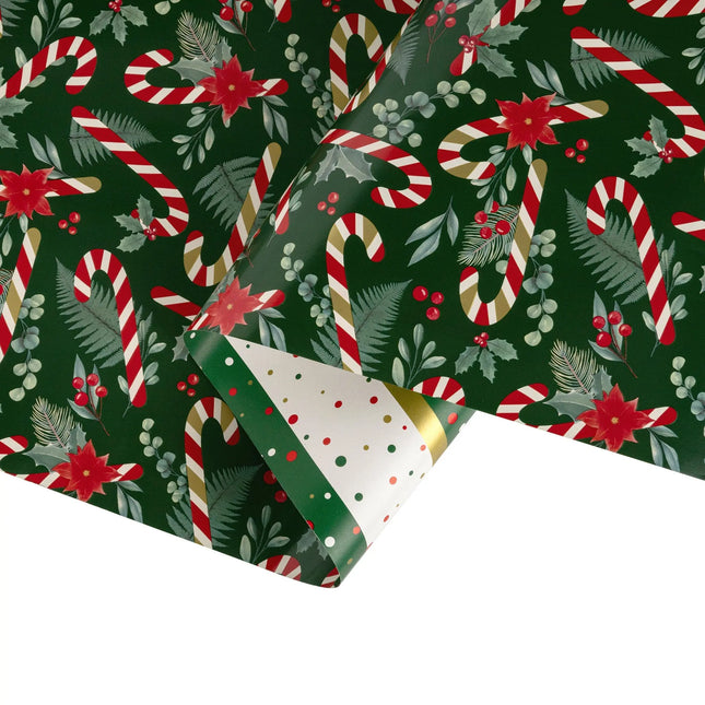 Double-sided festive gift wrap featuring classic candy cane poinsettia design and shiny dotted stripe