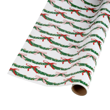 Two-sided metallic wrapping paper combining elegant bow garland and bold festive plaid
