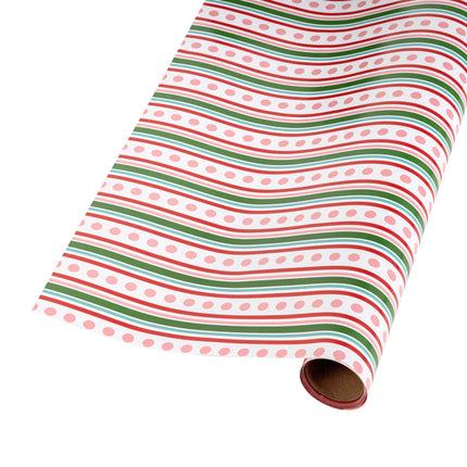 Whimsical reversible Christmas paper with playful stripe-dot pattern and ornamental evergreen trees
