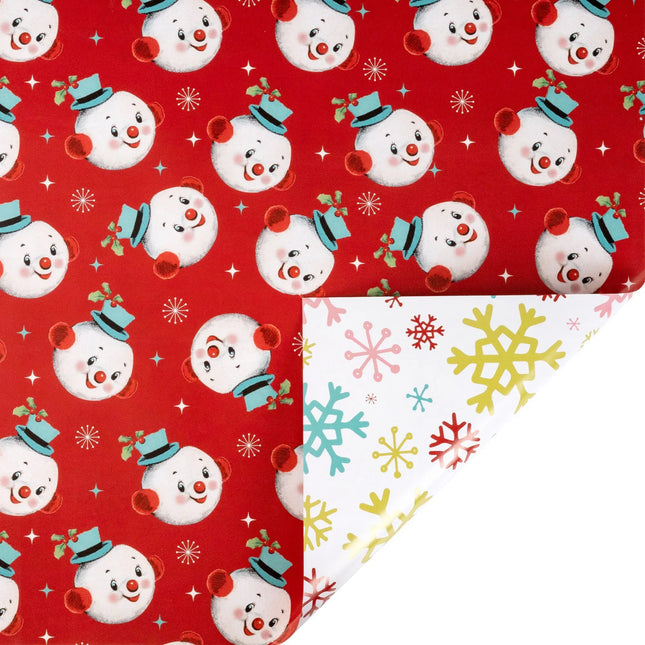 30"x10' reversible Christmas wrap with retro snowman faces on red front and colorful vintage snowflake print reverse