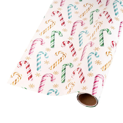 Retro-style double layer wrapping paper pairing gold-accented candy cane snowflake design and classic colorful vintage ornament print.