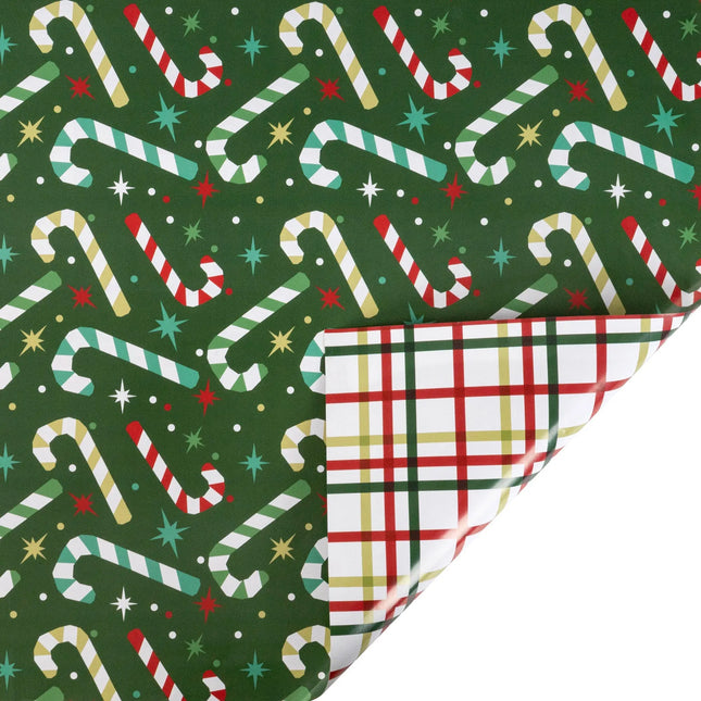 30"x10' reversible Xmas wrap, dark green modern candy cane & star print front and classic red-green geo plaid reverse