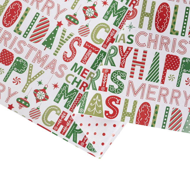 Double-sided gift wrap featuring playful holiday typography with ornaments and classic red dot pattern