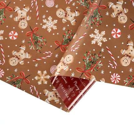 Double-sided festive gift wrap featuring warm gingerbread cookie pattern and classic holiday greeting text design