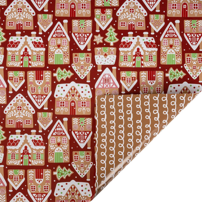30"x10' reversible holiday wrap with whimsical gingerbread houses on red front and icing swirl pattern reverse