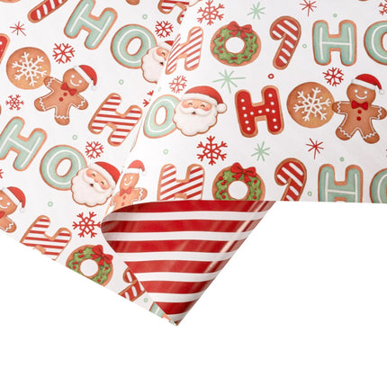 Double-sided festive gift wrap featuring playful HO HO Santa gingerbread pattern and bold red-white stripe