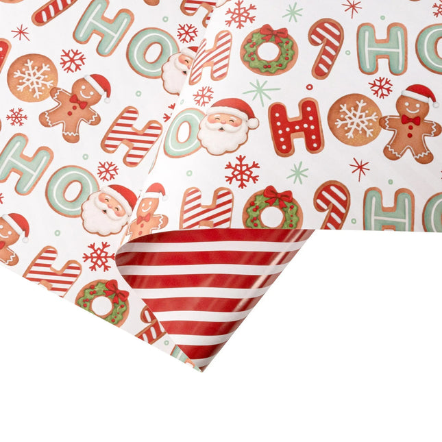 Double-sided festive gift wrap featuring playful HO HO Santa gingerbread pattern and bold red-white stripe