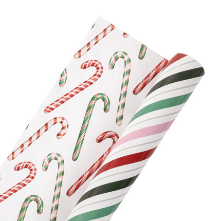 Two-sided wrapping paper combining bright candy-colored stripes and classic candy cane artwork