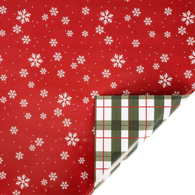 30"x10' reversible holiday wrap with falling snowflakes on red front and classic Santa plaid reverse