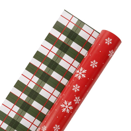 Two-sided wrapping paper combining crisp white snowflake print and timeless holiday plaid design