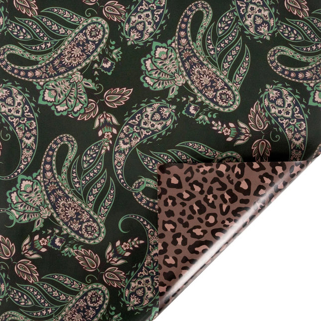 30"x10' reversible holiday wrapping paper, featuring lush green paisley on one side and chic animal print on the other.