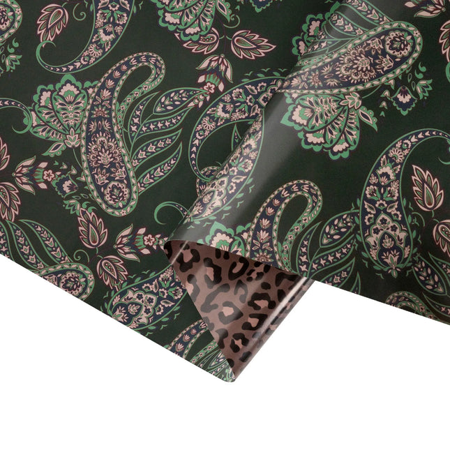 Double-sided gift wrap with elegant green paisley pattern and trendy neutral animal print for modern Christmas gifts.
