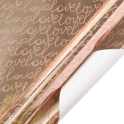 Rose gold metallic wrapping paper with script “love” (white back); gift wrapping.