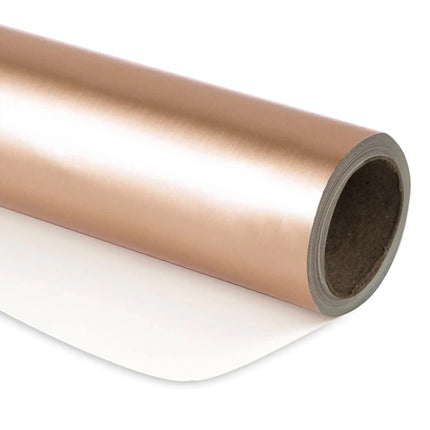 Roll of rose gold matte wrapping paper; gift packaging.
