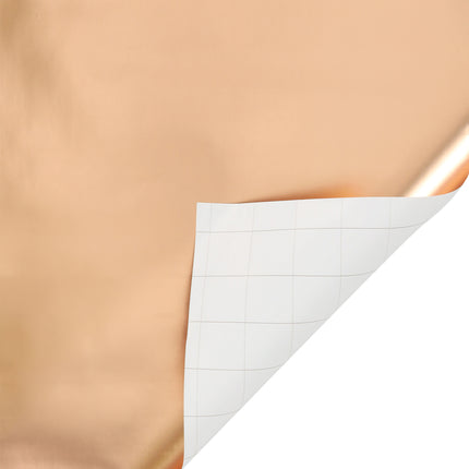 Rose gold matte wrapping paper (grid-lined back); gift wrapping.