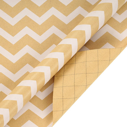 Kraft Christmas wrapping paper with printed white chevron stripes pattern and grid marking on reverse side