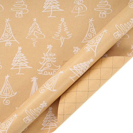 Kraft Christmas wrapping paper with printed white Christmas tree pattern and grid marking on reverse side
