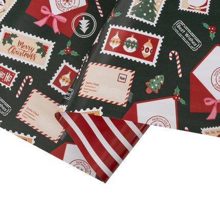 Reversible Christmas paper with holiday stamp illustrations on one side and coordinating red-white stripes on the other.