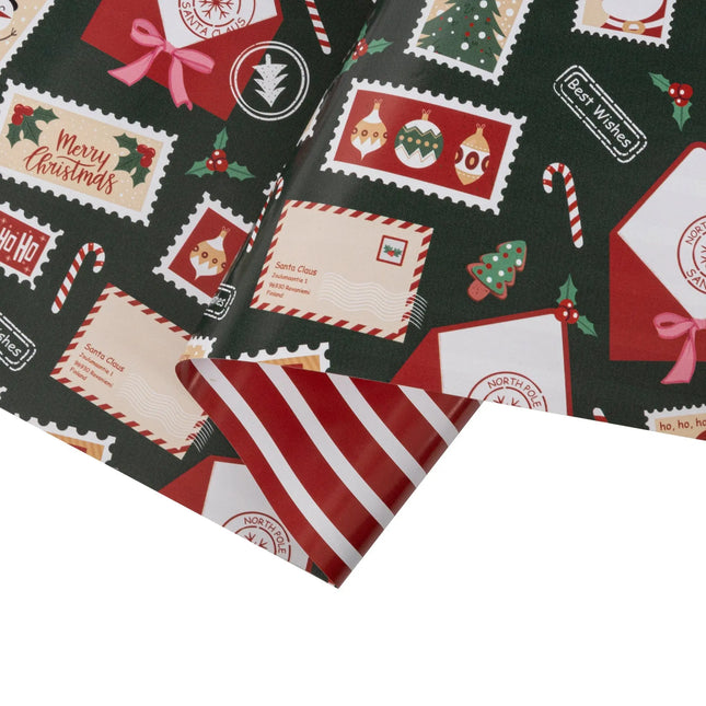 Reversible Christmas paper with holiday stamp illustrations on one side and coordinating red-white stripes on the other.