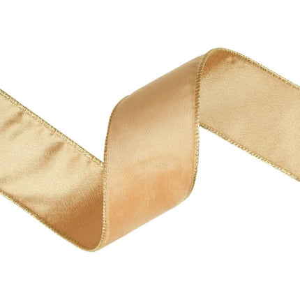  A curled piece of 2 1/2" gold velvet wired ribbon, displaying both sides’ plush velvet texture and gold detailing, perfect for stylish decorations.