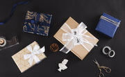 30" x 10' Wrapping Paper Bundle (4-pack) | Gold & Navy Foil