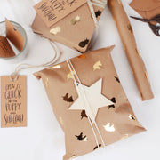 Brown gold foil kraft wrapped gift