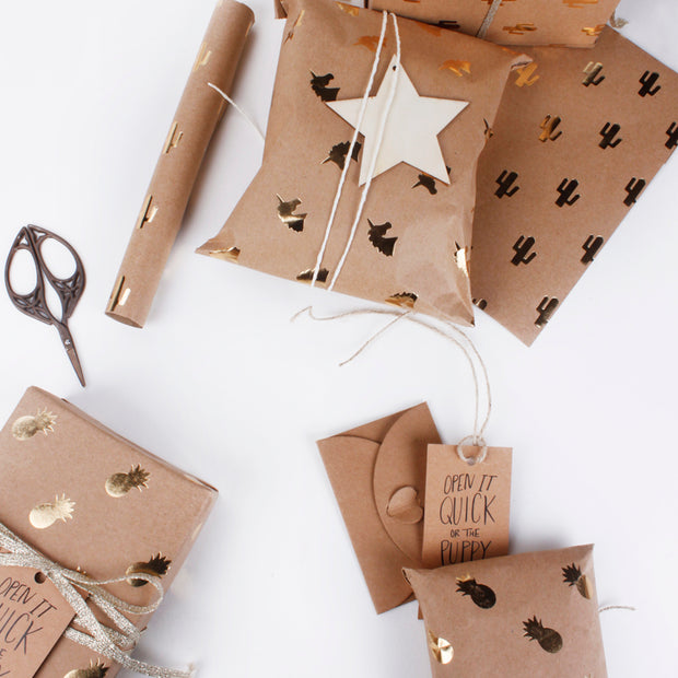 Brown and gold kraft wrapped gifts