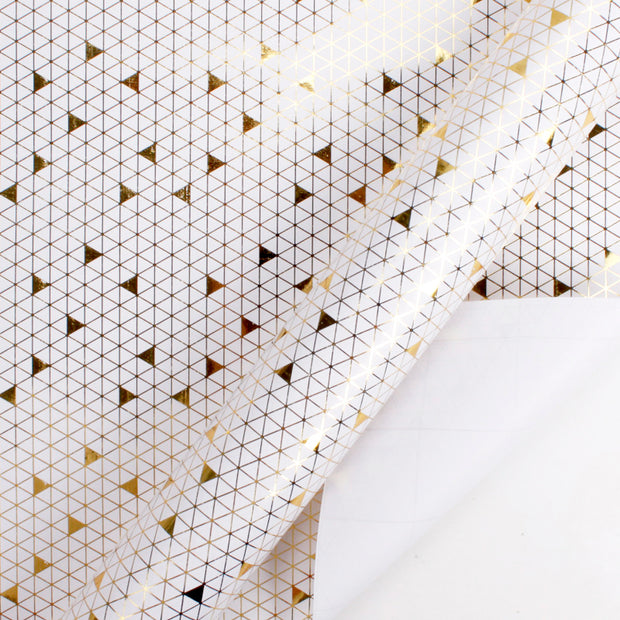 White and gold foil triangle printed wrapping paper roll