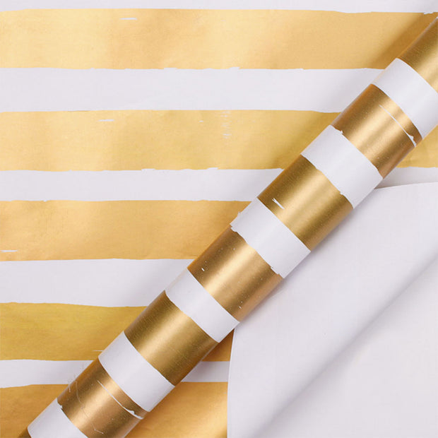 White and gold metallic stripe wrapping paper roll