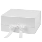  White box with satin bow. Clean, ideal for elegant present packaging.