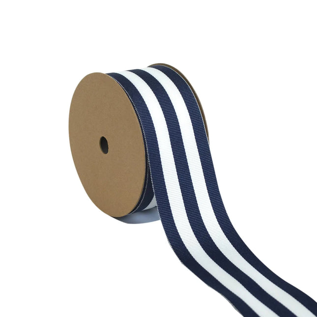 Navy & white vertical stripe grosgrain ribbon on spool, partially unrolled